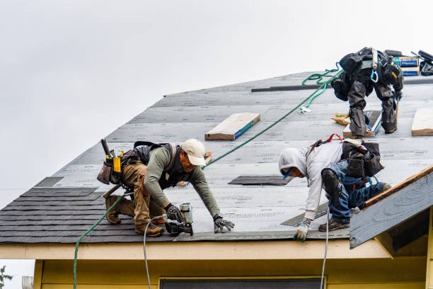 Professional Gutter Installation technician working in Marquette, KS